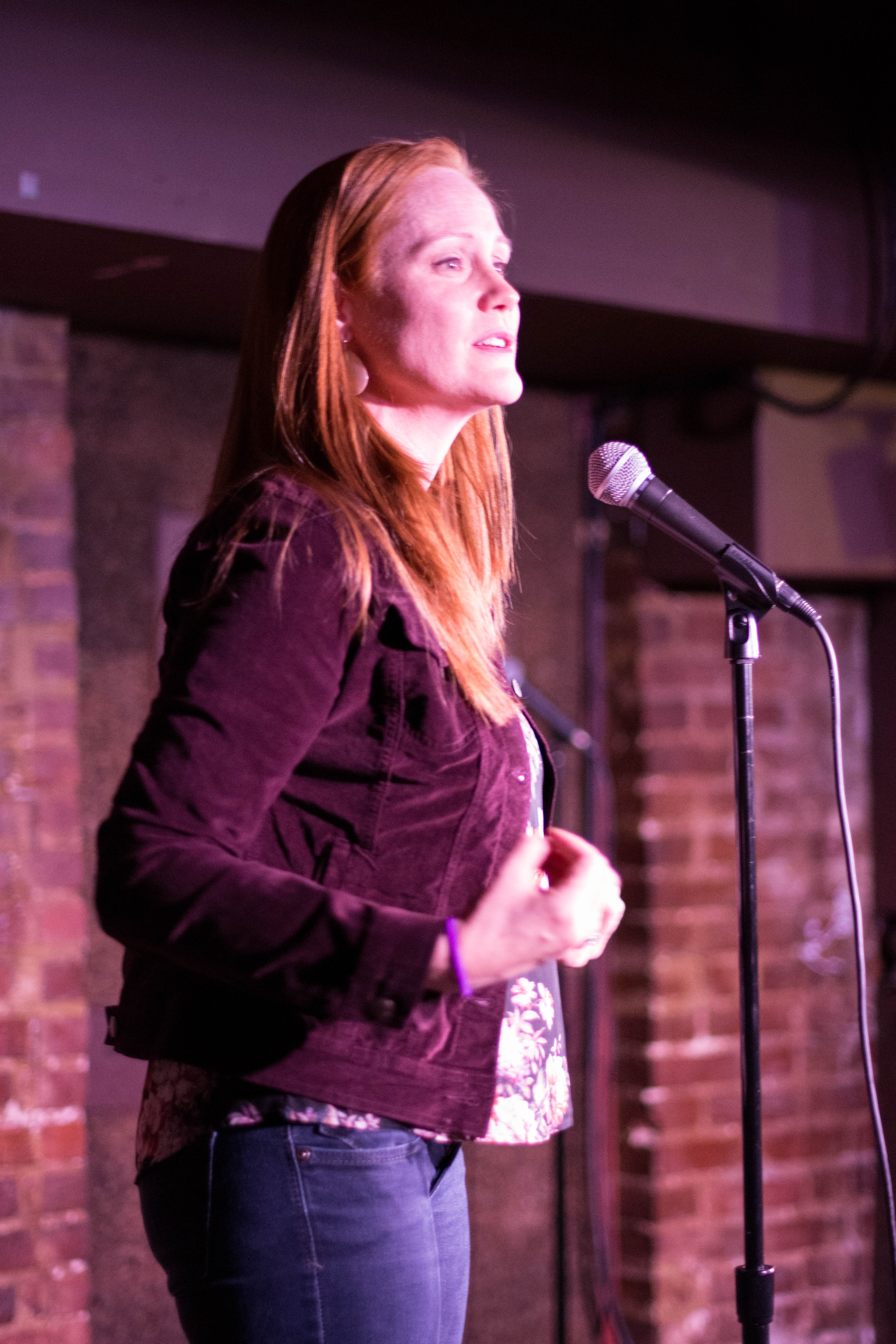 Wendy Bohon speaking on stage.